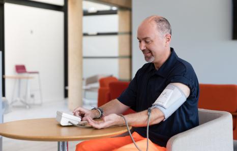 rail worker taking their blood pressure